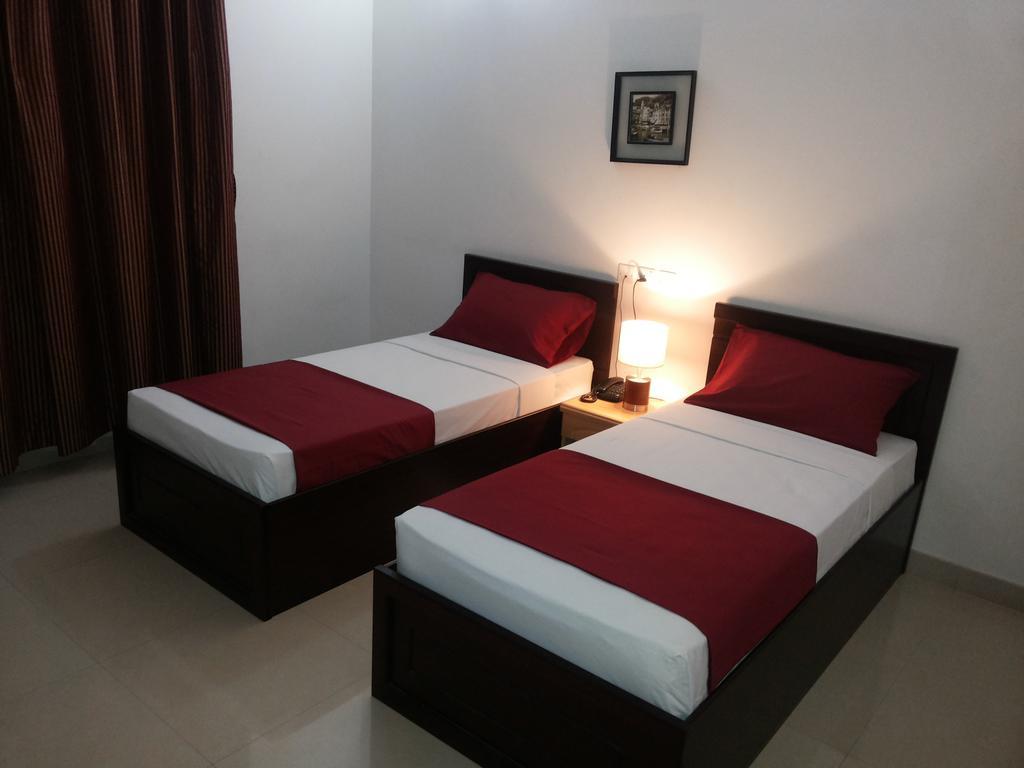 Azaiba Hotel Apartments Maskat Oda fotoğraf